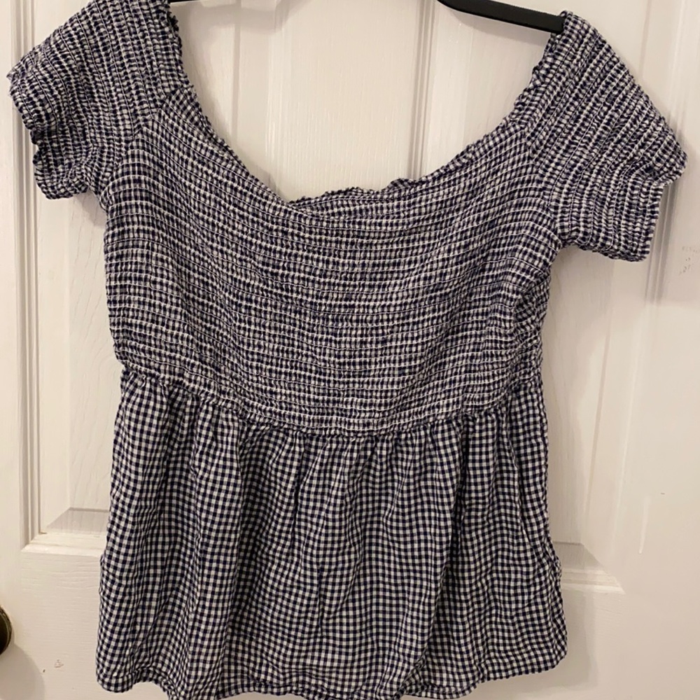 Shoulder cut off shirt